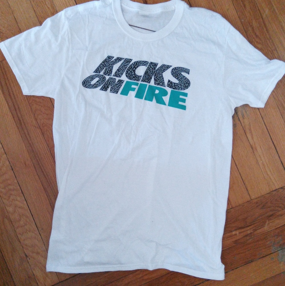 Mens size Large short sleeve t-shirt. Never worn.